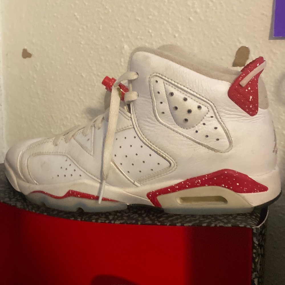 Red and white jordan 6s